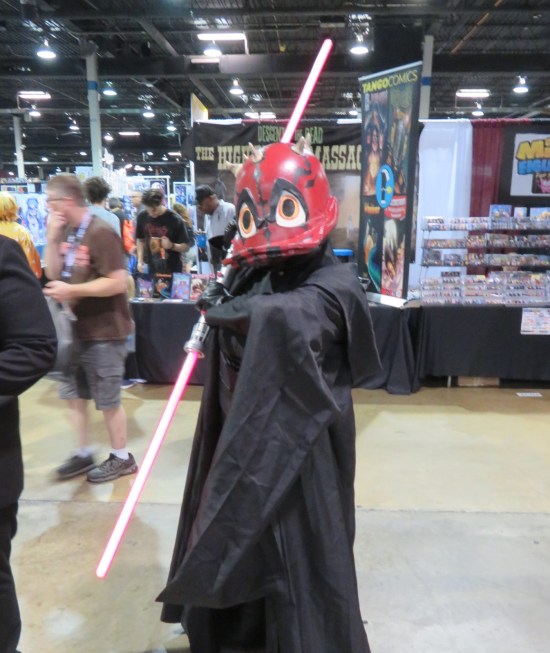 Darth Maul in black robe but his head is shaped like a Disney duck
