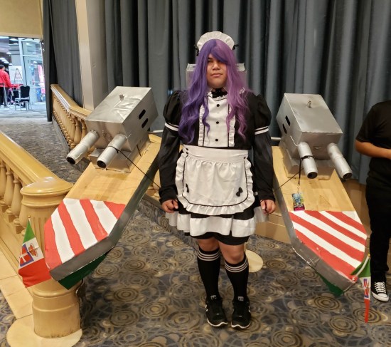 maid costume with giant battleships on each arm.