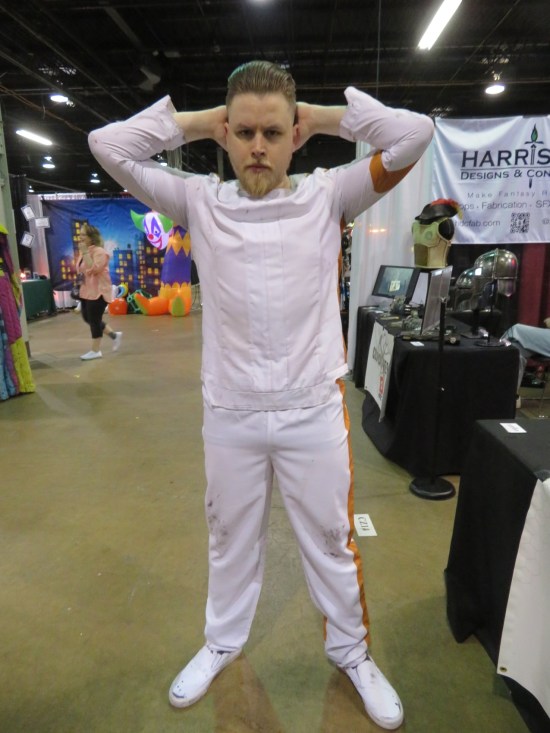 Kino Loy holding his heads behind his head, like in the show.