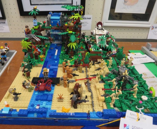 Bunch of Lego sets, and possibly some non-Lego toys, combined into a hodgepodge forest setting.