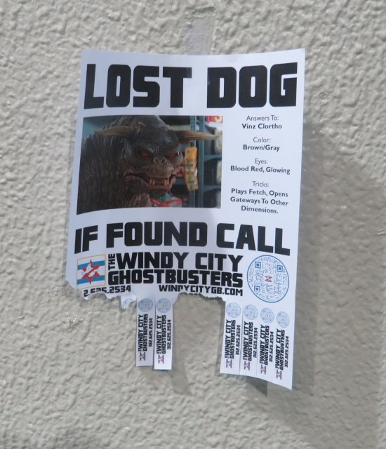 An imitation "lost dog" flyer hanging on a wall, sporting a photo of one of Zuul's dogs from "Ghostbusters".