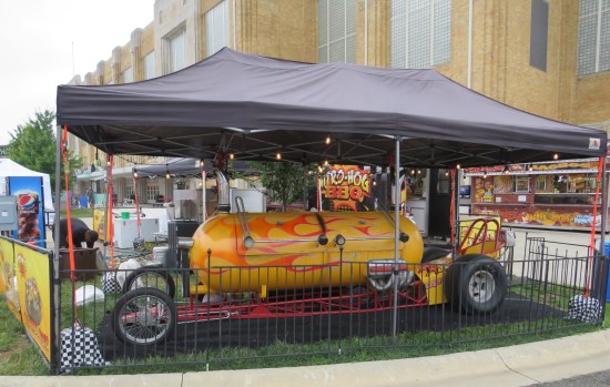 A giant meat smoker painted black and bearing bitchin' flame decals.
