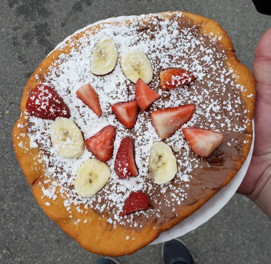 Nutellaphant Ear taking up an entire paper plate.