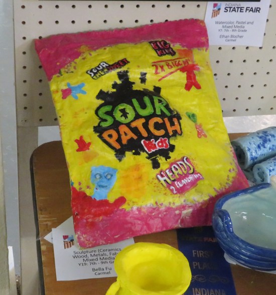 A sculpture shaped like a family-sized bag of Sour Patch Kids candies.