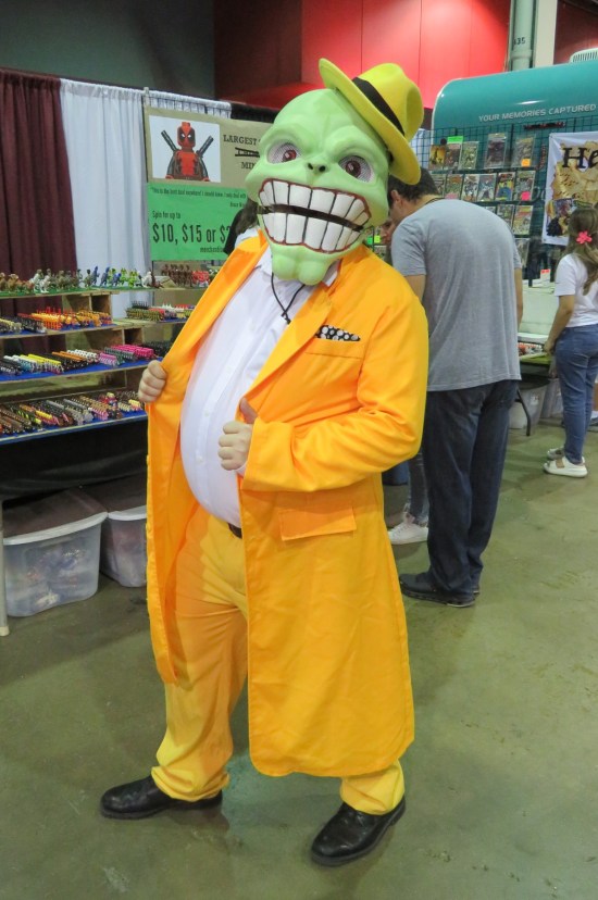 The Mask in yellow suit, with giant head.