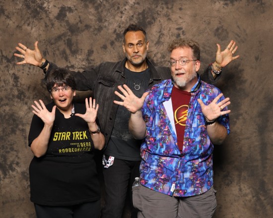 us doing jazz hands while Todd Stashwick presides over us in the back.
