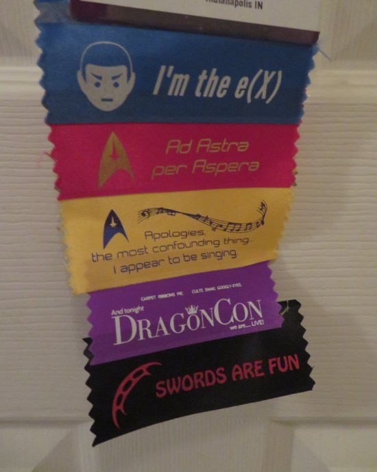 Dragon Con ribbons affixed to Anne's badge, mostly Star Trek-themed.