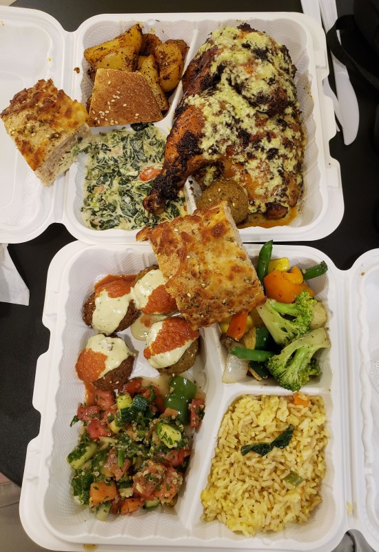 Aviva meals! Two trays' worth of Mediterranean food. Refer to caption.