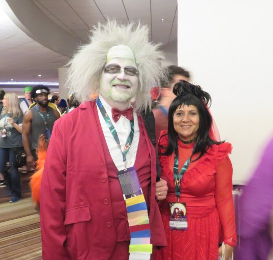 cosplay: Beetlejuice and Lydia in red.