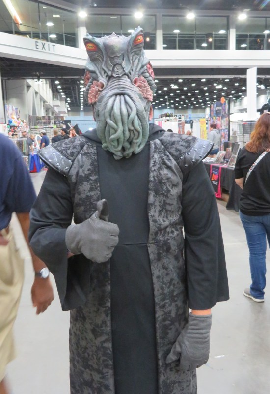 cosplay: Cthulhu mask, gray monk robes.