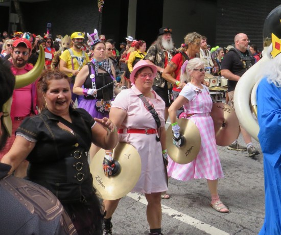 Barbie in gingham dress with cymbals, plus a League of Their Own cymbalist.