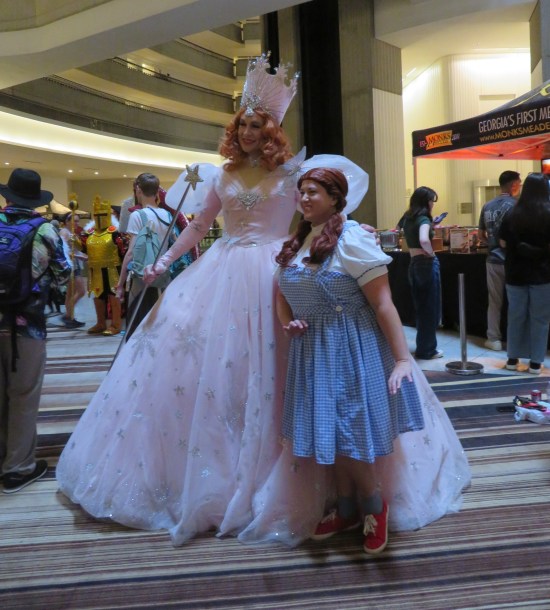 cosplay: Glinda the Good Witch and Kansas exile Dorothy Gale.