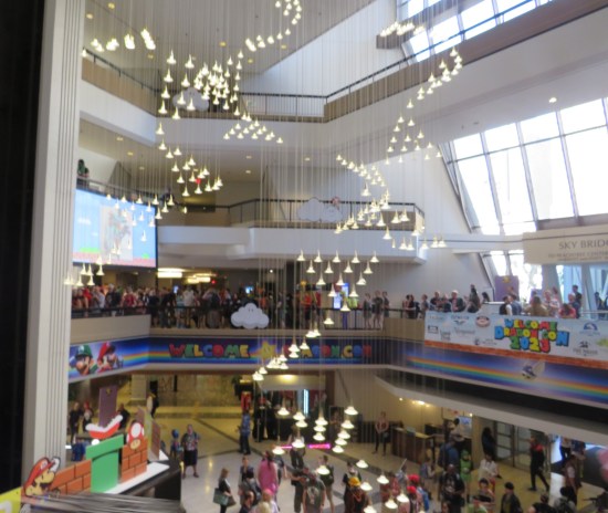 Hilton hotel lobby shot from the second floor, with Super Mario decorations all around.