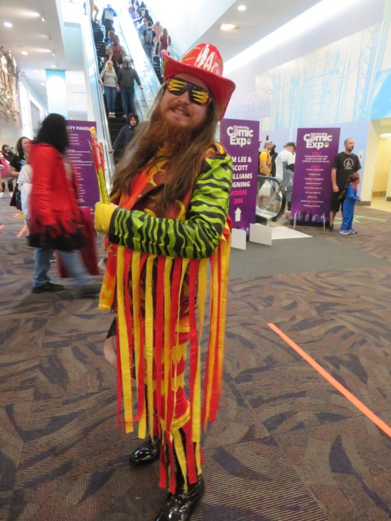 cosplay: Macho Man Randy Savage, carrying a bunch of beef jerky.