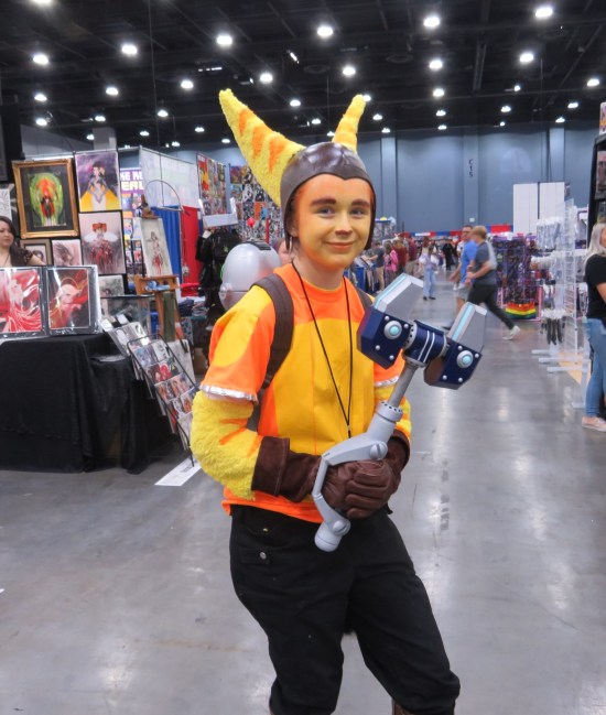 cosplay: Ratchet with a Clank robot in her backpack.