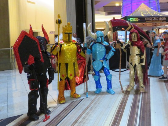 cosplay: four armored folks, very brightly and simply colored.