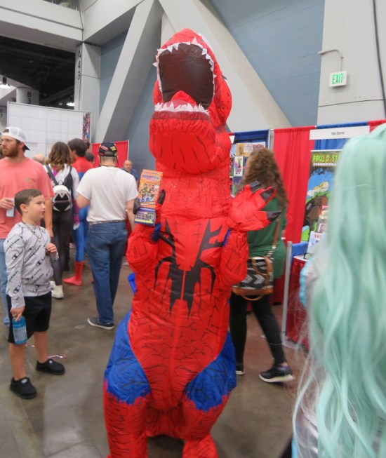 cosplay: inflatable T-Rex with Spider-Man costume design.