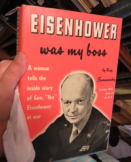 Pinkish cover to Kay Summersby's memoir "Eisenhower Was My Boss" with Ike on the cover in black-and-white.