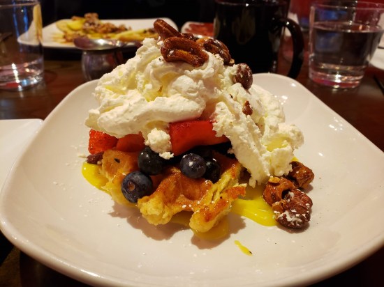 Belgian waffle buried in ingredients listed in the caption.