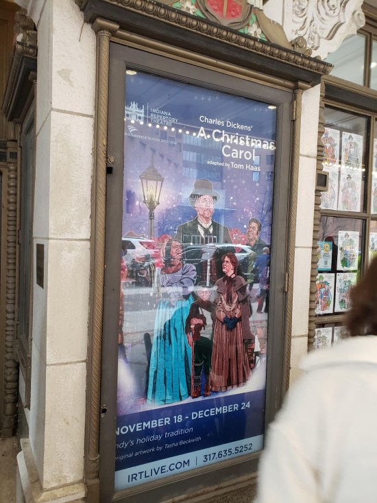 Awkward side view on an outdoor poster for the IRT's version of "A Christmas Carol".