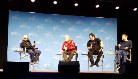 An elderly Richard Dreyfuss on stage, slumped in a chair. Three other white guys are in seats opposite him.