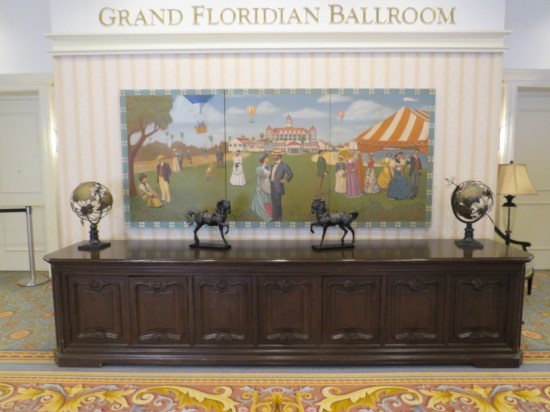 Carved altar table with two small horse statues. Hanging above it is another Victorian painting that reminds me of "My Fair Lady".