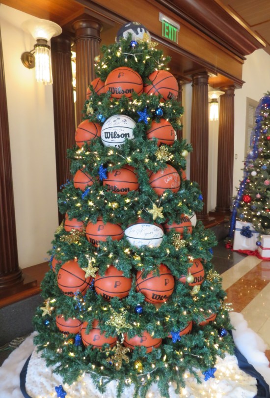 Christmas tree covered in basketballs.