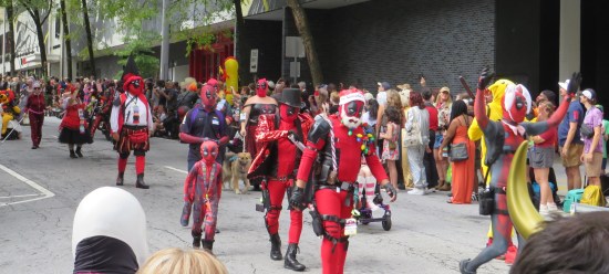 A parade of Deadpool variant costumes.