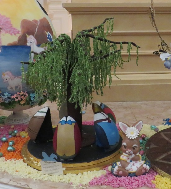 Fake bonsai tree surrounded by egg-shaped cars. Apparently this was an old Disney World ride?