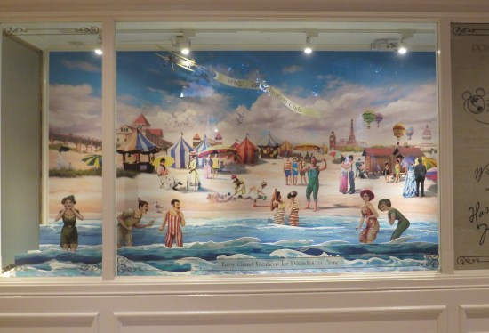 Painting of an early 20th-century crowded beach scene. Flying at top is a plane with a banner reading "Disney Vacation Club". At bottom, the message "Enjoy Grand Vacations for Decades to Come."