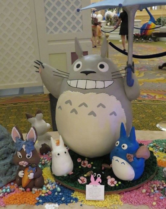 Egg shaped like the giant rotund smiling gray creature Totoro.