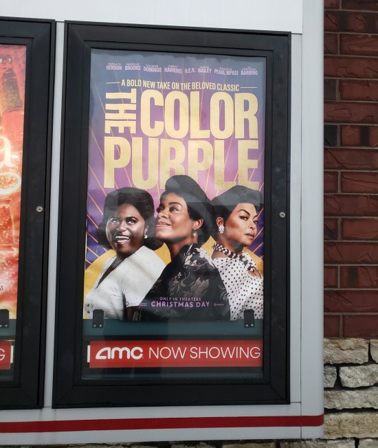 Movie poster for "The Color Purple" focusing on its three proud Black leading actresses.