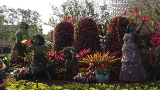 Topiary sculptures of three sisters from "Encanto". 