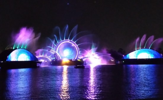 blue and purple gates coalescing, fountains spraying out the tops of every curve