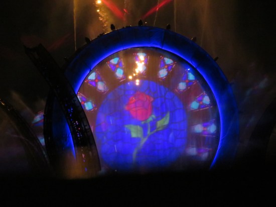 Blue stargate with a "Beauty and the Beast" rose in the center, plus French castle stained glass around the circumference.