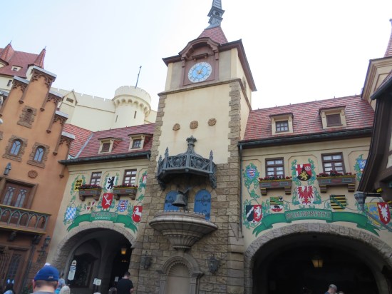 German building with two entrances labeled 'Biergarten' and 'Sommerfest'. German crests surround each label.