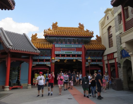 Chinese gift shop that looks just like the paifang (gate) in the earlier photo. Lots of guests streaming out the doors.