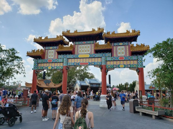 Large Chinese gate leading into EPCOT's large China area. This paifang has three arches.