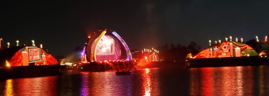 Everything's red and yellow; Archways show Day of the Dead candle-lighting a la "Coco".