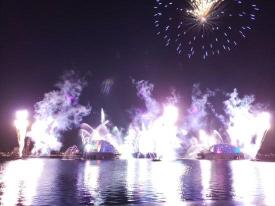 WHITE EXPLOSIONS! It looks like the Air Force just strafed the entire lagoon with bombs from above. Also, there's one exploding firework up high.