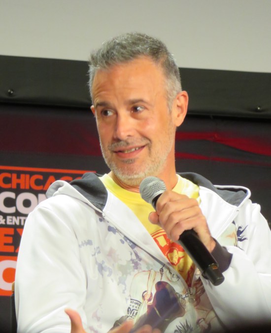 Freddie Prinze Jr smiling at a mic.