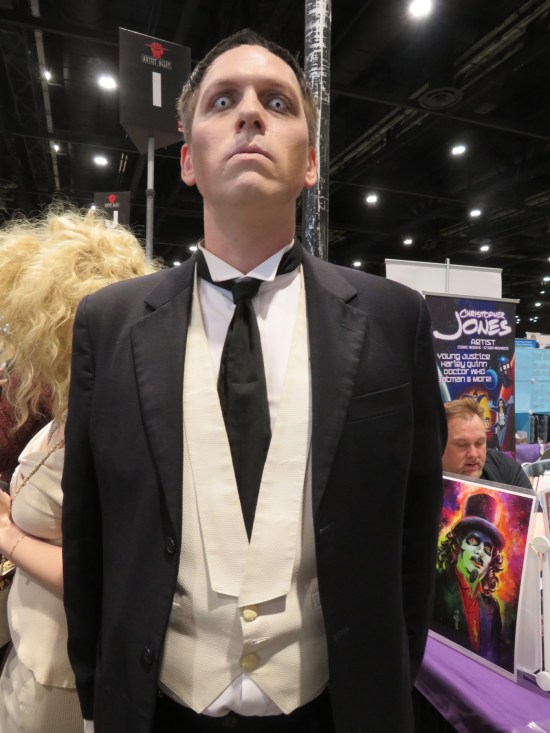 Lurch cosplayer looms.