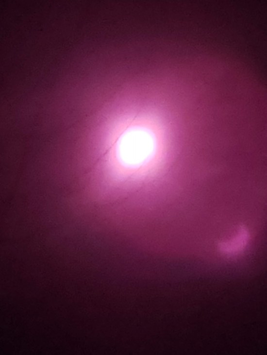 A very purple-filtered sun overhead.