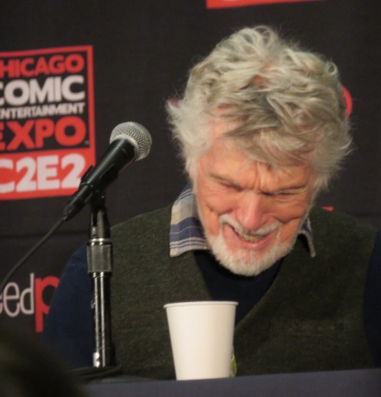 Tom Skerritt laughing at his mic.