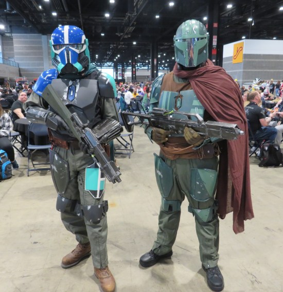 Blue and grey Stormtrooper variant, and a Mandalorian in green shades.