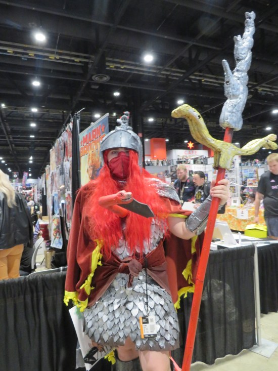 Red snake-themed warrior, complete with polearm with snakes as the hilt.