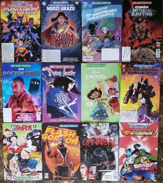 Twelve free comics in four rows of three.