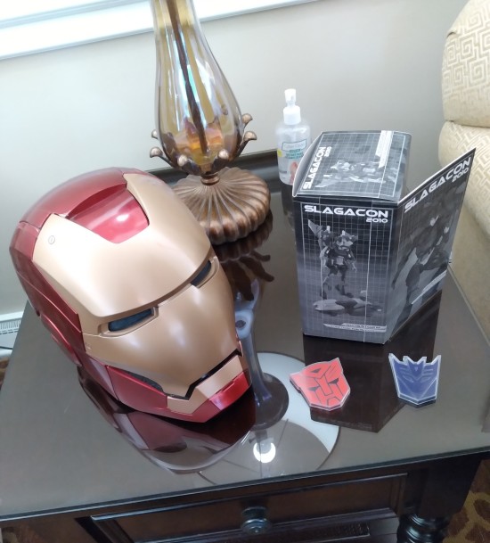Iron Man helmet, Nova Storm toy in its convention exclusive box, and some tissues for the grieving.