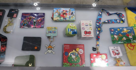 Vitrine of keychains and other accessories from Hello Kitty, One Piece, Spider-Man, et al.