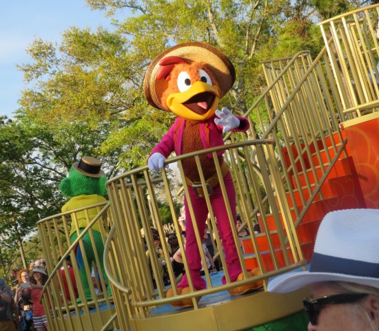 Dutch-angled pic of Jose Carioca dancing on the back of a parade float.